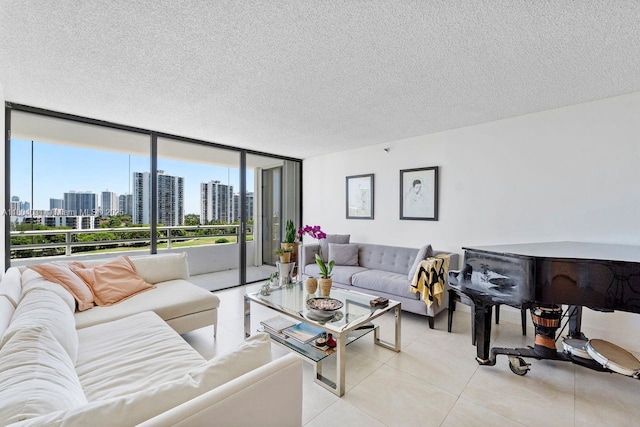 20355 NE 34th Ct Unit 929, Aventura, FL 33180 - living area with expansive windows, a view of skyline, a textured ceiling, and light tile patterned floors