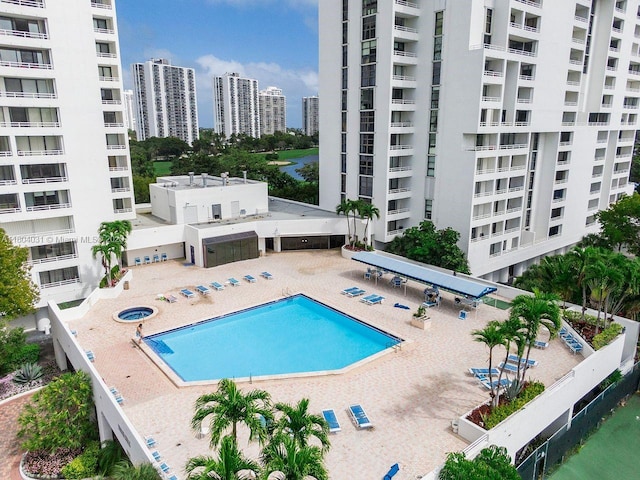20355 NE 34th Ct Unit 929, Aventura, FL 33180 - community pool featuring a patio and a view of city