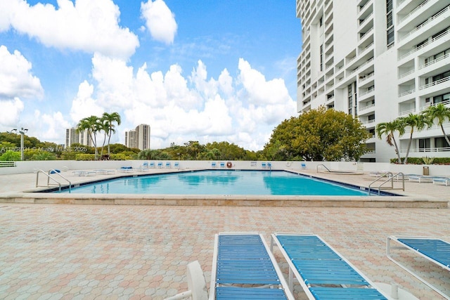 20355 NE 34th Ct Unit 929, Aventura, FL 33180 - community pool featuring a patio