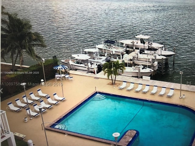 150 SE 25th Rd Unit 14H, Miami, FL 33129 - community pool with a water view