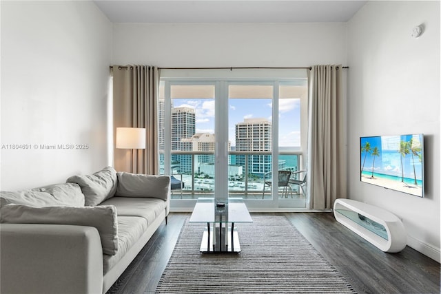 6770 Indian Creek Dr Unit Tsa1, Miami Beach, FL 33141 - living area featuring dark wood finished floors and baseboards