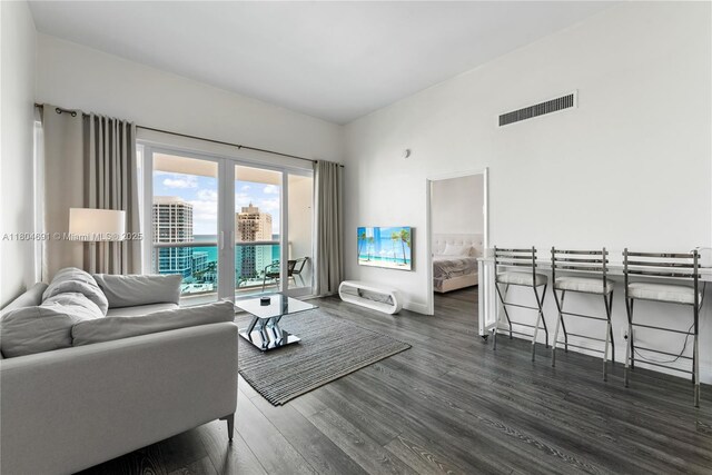 6770 Indian Creek Dr Unit Tsa1, Miami Beach, FL 33141 - living area featuring dark wood-type flooring
