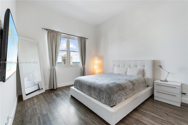 6770 Indian Creek Dr Unit Tsa1, Miami Beach, FL 33141 - bedroom with wood finished floors and baseboards