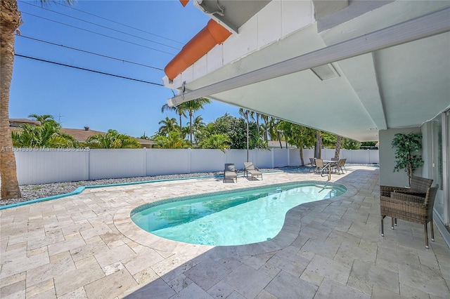 1950 NE 55th Ct, Fort Lauderdale, FL 33308 - view of pool with a fenced backyard and a patio