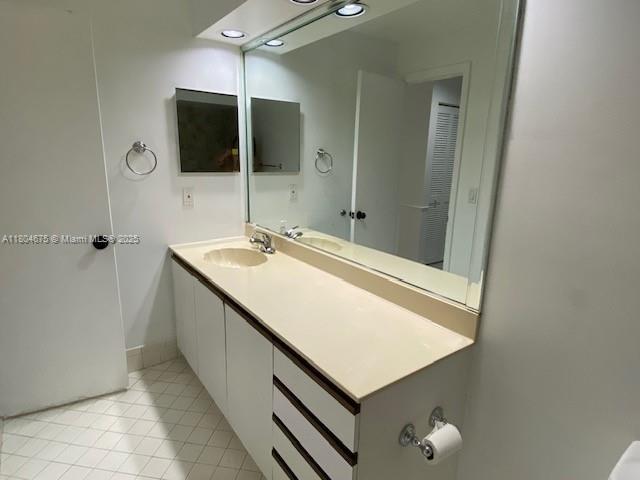 14953 SW 143rd Ct, Miami, FL 33186 - bathroom with vanity and tile patterned flooring