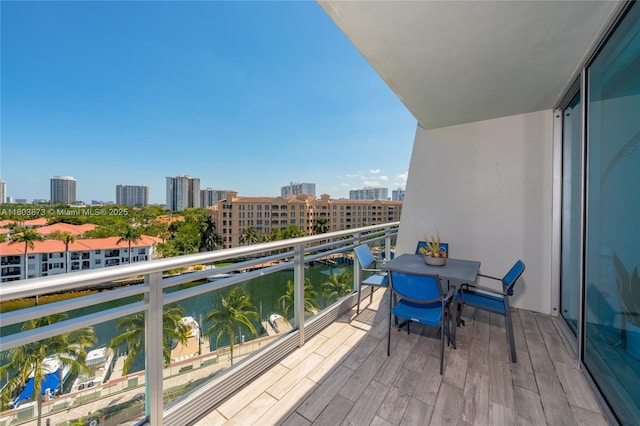 2950 NE 188th St Unit 540, Aventura, FL 33180 - balcony with a view of city, a water view, and outdoor dining area