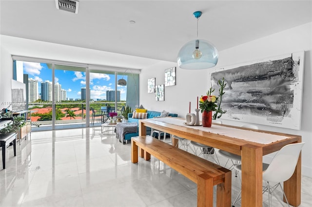 2950 NE 188th St Unit 540, Aventura, FL 33180 - dining room featuring a view of skyline