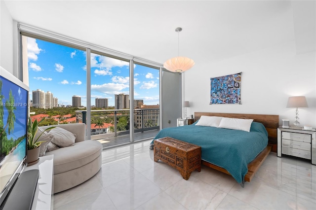 2950 NE 188th St Unit 540, Aventura, FL 33180 - bedroom featuring expansive windows and access to exterior