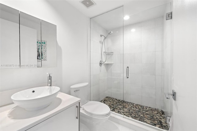 2950 NE 188th St Unit 540, Aventura, FL 33180 - full bathroom with a stall shower, toilet, vanity, and recessed lighting