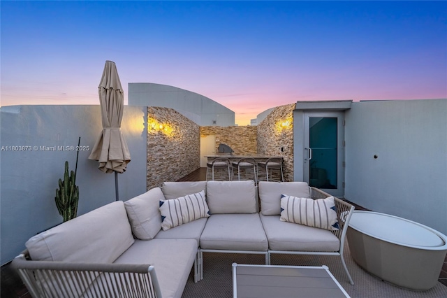 2950 NE 188th St Unit 540, Aventura, FL 33180 - patio terrace at dusk with an outdoor living space