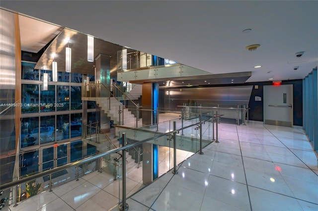 2950 NE 188th St Unit 540, Aventura, FL 33180 - building lobby featuring a security system and stairs