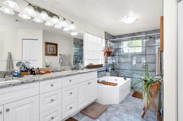 2626 Sawyer Ter, Wellington, FL 33414 - bathroom featuring a shower stall, a tub, and double vanity