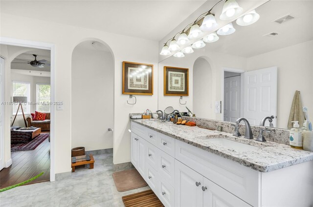2626 Sawyer Ter, Wellington, FL 33414 - ensuite bathroom with a ceiling fan and double vanity