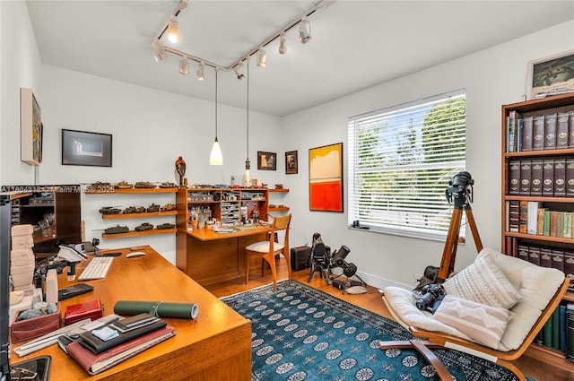 2626 Sawyer Ter, Wellington, FL 33414 - office space with track lighting, wood finished floors, baseboards, and bar