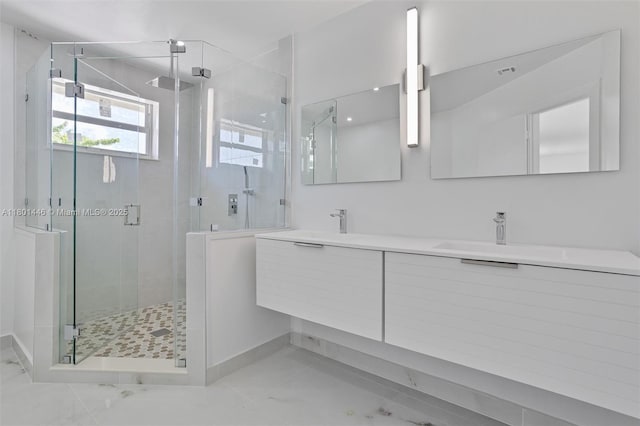 8501 NW 191st St, Hialeah, FL 33015 - bathroom with a stall shower, double vanity, and baseboards