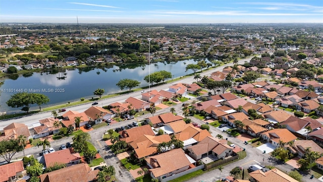 8501 NW 191st St, Hialeah, FL 33015 - aerial view of property and surrounding area with a large body of water and nearby suburban area