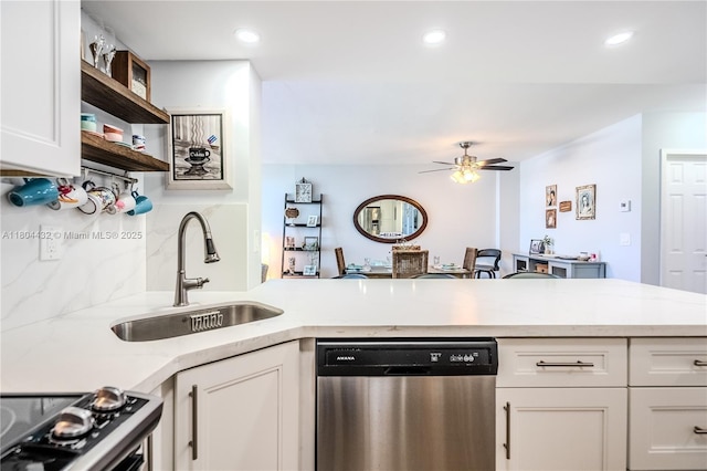 2017 S Ocean Dr Unit 1404, Hallandale Beach, FL 33009 - kitchen with dishwasher, a sink, range, open shelves, and a ceiling fan