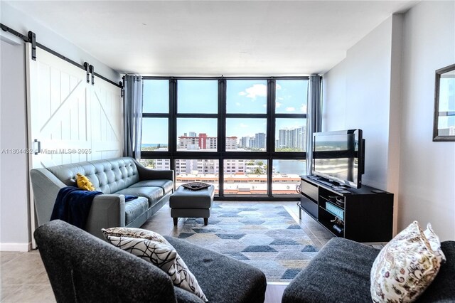 2017 S Ocean Dr Unit 1404, Hallandale Beach, FL 33009 - living area with a barn door and floor to ceiling windows