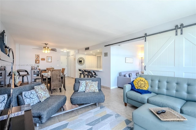 2017 S Ocean Dr Unit 1404, Hallandale Beach, FL 33009 - living room with a barn door and ceiling fan