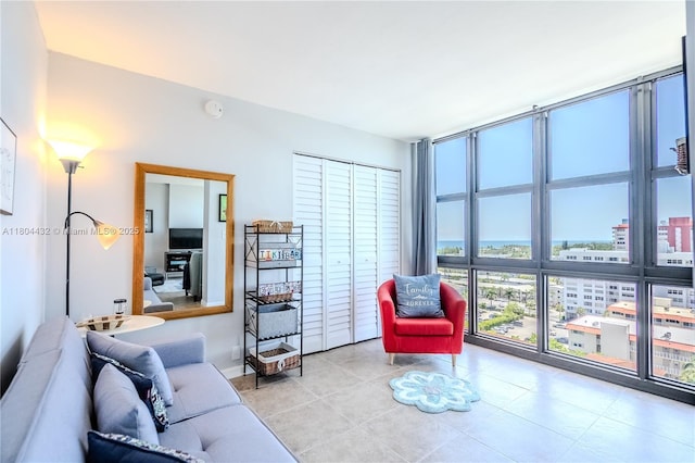 2017 S Ocean Dr Unit 1404, Hallandale Beach, FL 33009 - living room with expansive windows and light tile patterned floors