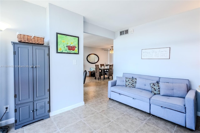 2017 S Ocean Dr Unit 1404, Hallandale Beach, FL 33009 - living room featuring light tile patterned floors and baseboards