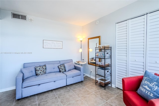2017 S Ocean Dr Unit 1404, Hallandale Beach, FL 33009 - living area with tile patterned flooring and baseboards