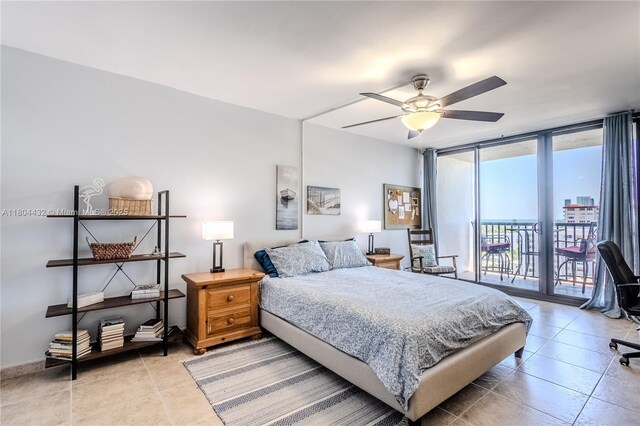 2017 S Ocean Dr Unit 1404, Hallandale Beach, FL 33009 - bedroom with access to exterior, light tile patterned floors, a ceiling fan, and floor to ceiling windows