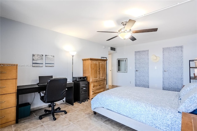2017 S Ocean Dr Unit 1404, Hallandale Beach, FL 33009 - bedroom with a desk, light tile patterned flooring, and a ceiling fan