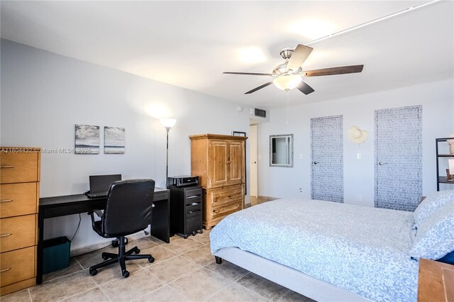 2017 S Ocean Dr Unit 1404, Hallandale Beach, FL 33009 - bedroom with a desk, light tile patterned flooring, and ceiling fan