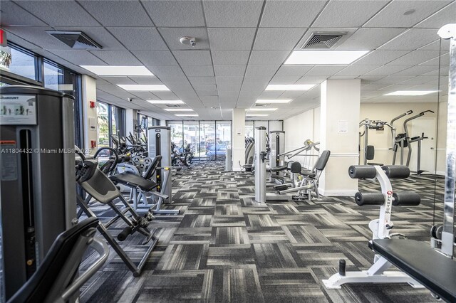 2017 S Ocean Dr Unit 1404, Hallandale Beach, FL 33009 - exercise room with dark colored carpet and baseboards