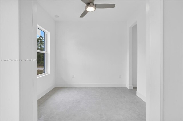935 Elgin St, Lehigh Acres, FL 33974 - empty room with ceiling fan and baseboards