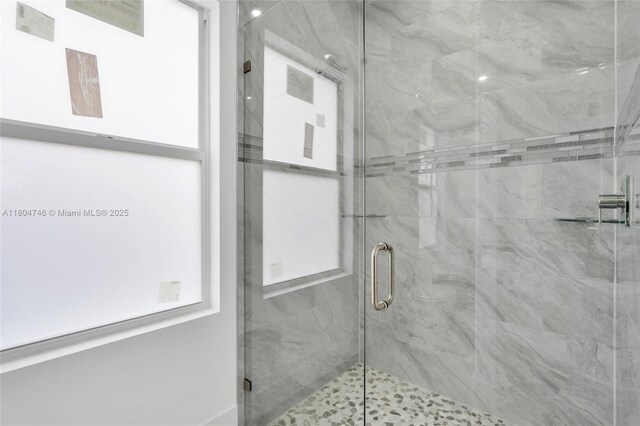 935 Elgin St, Lehigh Acres, FL 33974 - bathroom featuring a shower stall