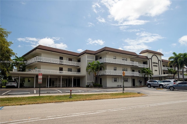 4200 Crystal Lake Dr Unit 204, Deerfield Beach, FL 33064 - view of property with uncovered parking