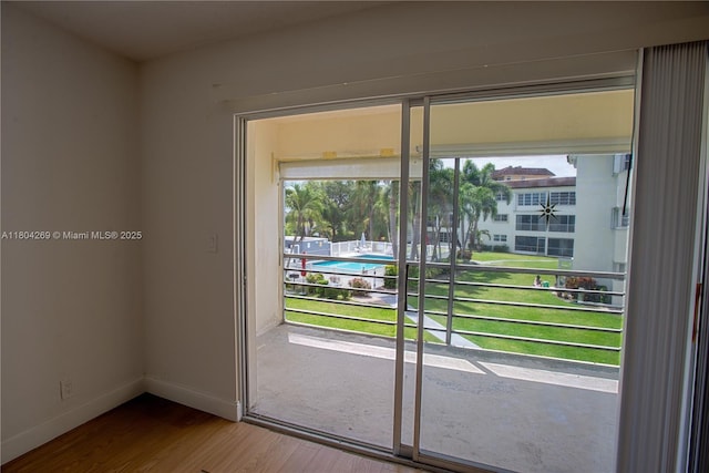 4200 Crystal Lake Dr Unit 204, Deerfield Beach, FL 33064 - entryway featuring wood finished floors and baseboards