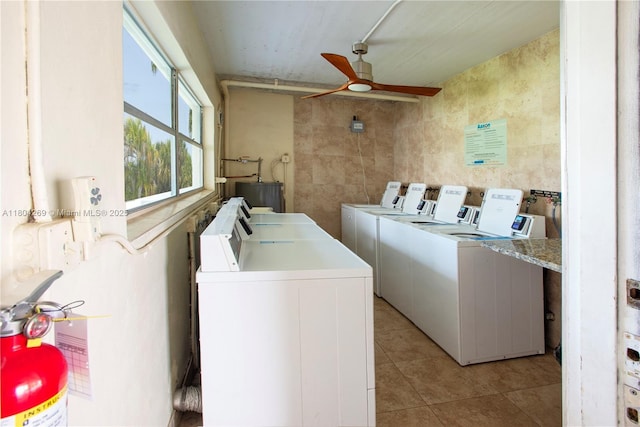 4200 Crystal Lake Dr Unit 204, Deerfield Beach, FL 33064 - shared laundry featuring washing machine and clothes dryer, ceiling fan, light tile patterned floors, and gas water heater
