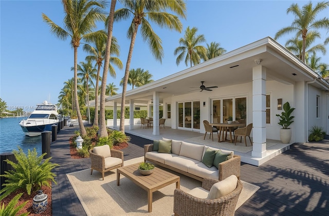 2341 Keystone, North Miami, FL 33181 - view of patio / terrace featuring a ceiling fan, an outdoor hangout area, outdoor dining area, and a deck with water view