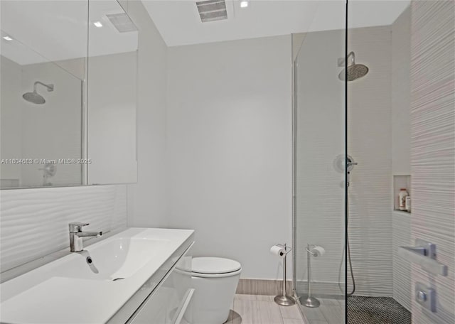 2341 Keystone, North Miami, FL 33181 - bathroom featuring a walk in shower, toilet, vanity, and baseboards