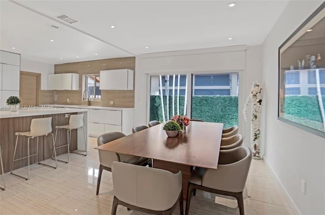 2341 Keystone, North Miami, FL 33181 - dining space featuring recessed lighting, baseboards, and light tile patterned floors