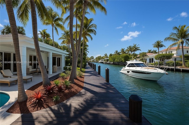2341 Keystone, North Miami, FL 33181 - dock featuring a water view and a patio area