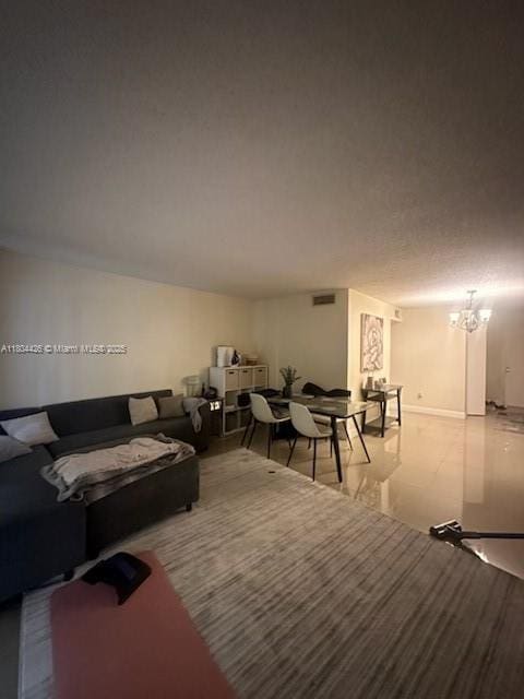 9351 Fontainebleau Blvd Unit B122, Miami, FL 33172 - living room with a chandelier and baseboards