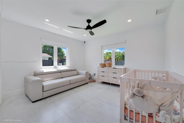 7843 SW 166th St, Palmetto Bay, FL 33157 - bedroom featuring multiple windows, a nursery area, ceiling fan, baseboards, and recessed lighting