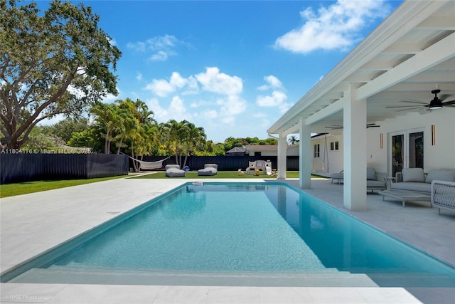 7843 SW 166th St, Palmetto Bay, FL 33157 - view of swimming pool with ceiling fan, a fenced backyard, a patio, and an outdoor living space