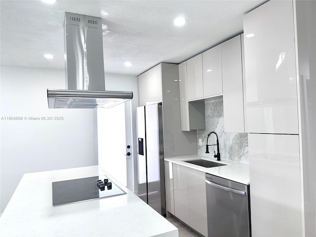 2421 N 56th Ter, Hollywood, FL 33021 - kitchen with dishwasher, island exhaust hood, modern cabinets, black electric stovetop, and refrigerator with ice dispenser
