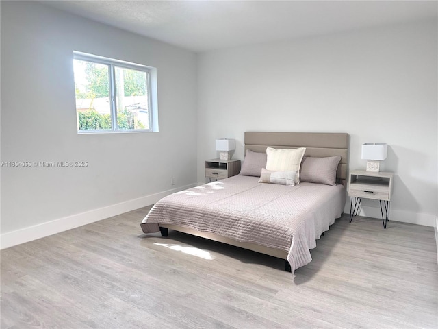2421 N 56th Ter, Hollywood, FL 33021 - bedroom featuring wood finished floors and baseboards