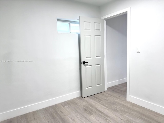 2421 N 56th Ter, Hollywood, FL 33021 - empty room with baseboards and wood finished floors