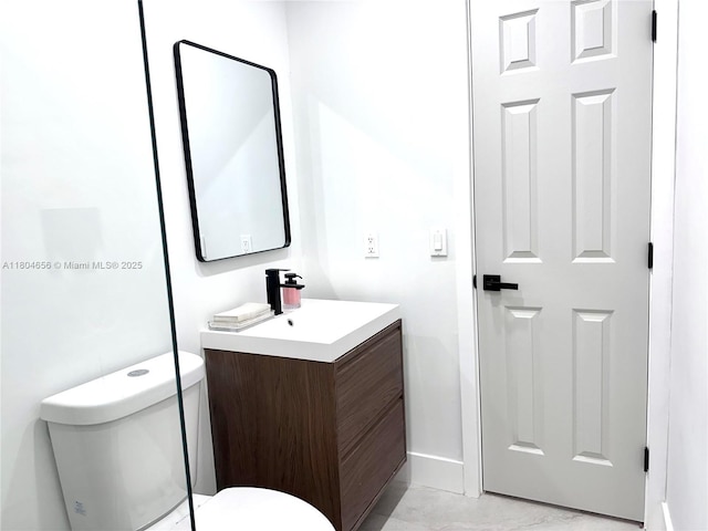 2421 N 56th Ter, Hollywood, FL 33021 - bathroom with vanity, toilet, and baseboards