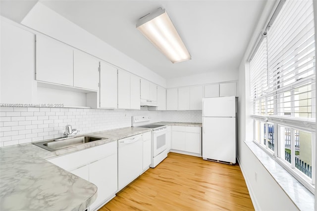 1051 Meridian Ave Unit 1D, Miami Beach, FL 33139 - kitchen featuring white appliances, under cabinet range hood, open shelves, and healthy amount of natural light