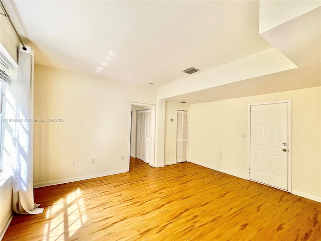 1051 Meridian Ave Unit 1D, Miami Beach, FL 33139 - unfurnished room featuring light wood-style floors and baseboards