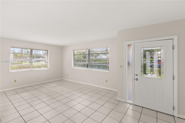 1242 Sevilla Ave, Coral Gables, FL 33134 - entrance foyer featuring baseboards and light tile patterned floors