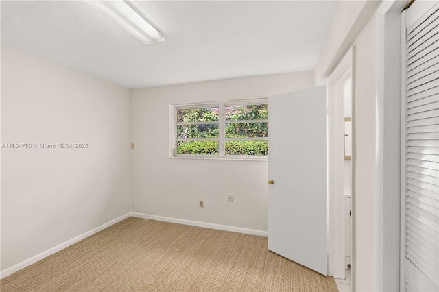 1242 Sevilla Ave, Coral Gables, FL 33134 - unfurnished room with light colored carpet and baseboards